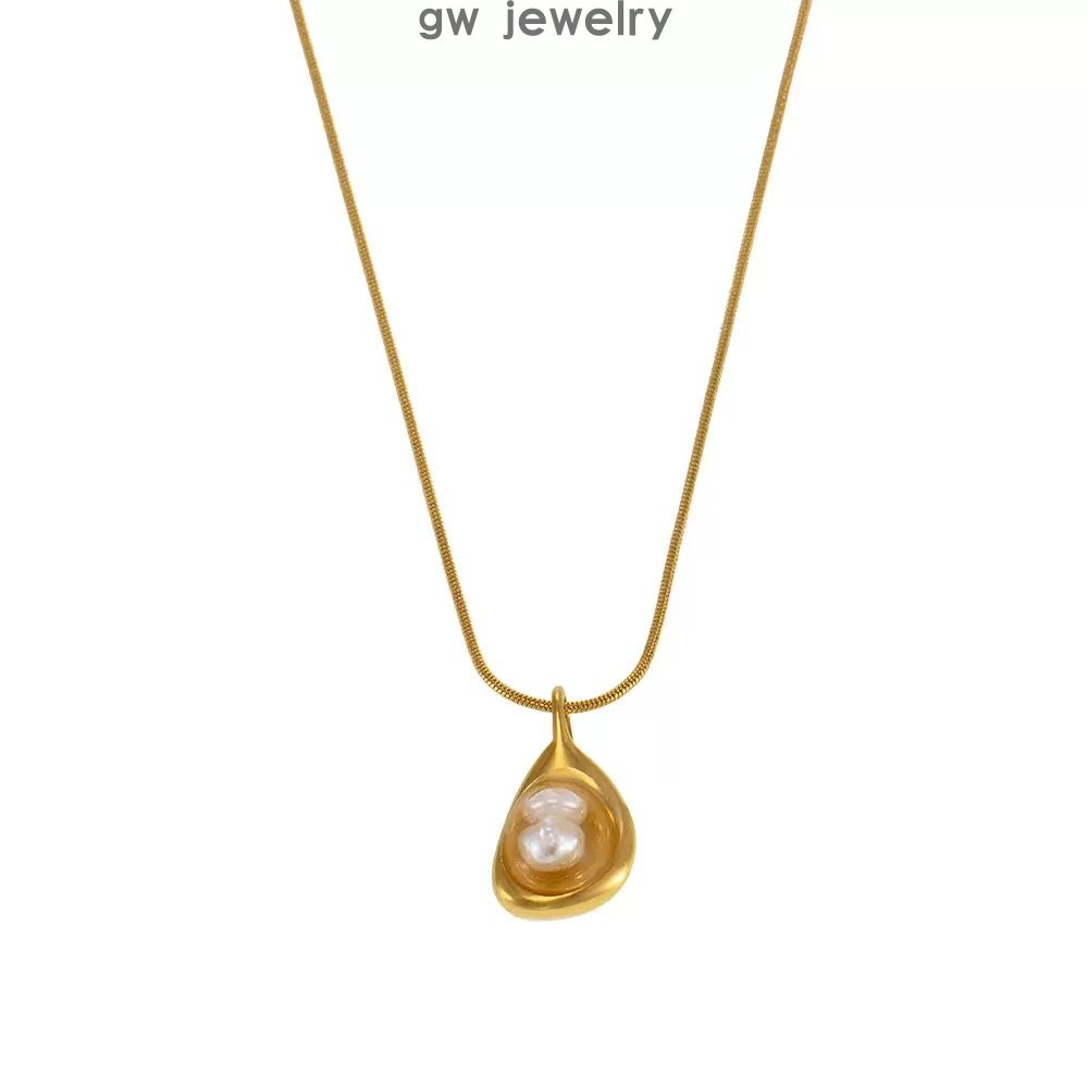 hollow water drop inlaid pearl pendant