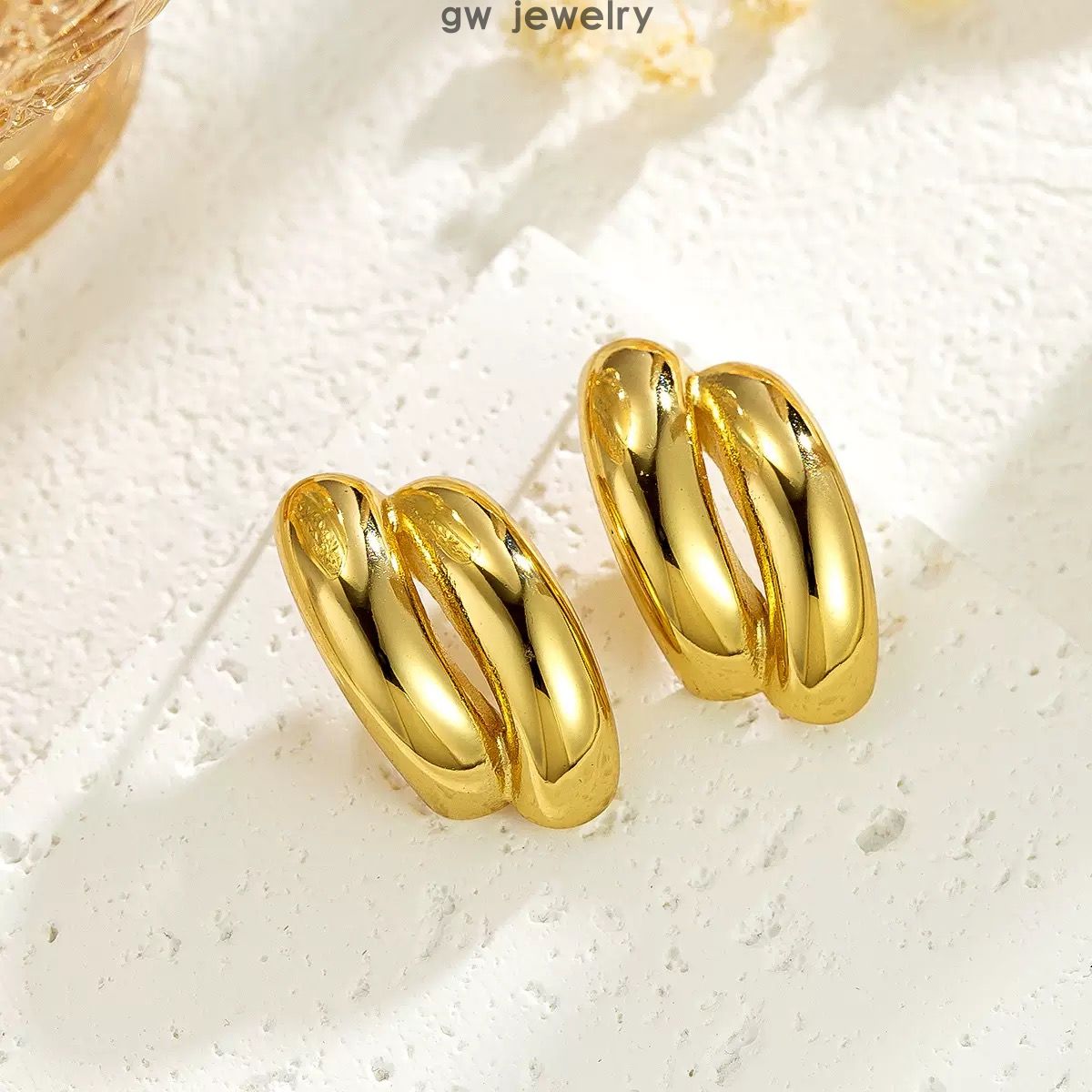 steel exaggerated earrings